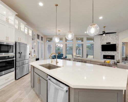 A,White,Kitchen,With,A,Granite,Island A,White,Kitchen,With,A,Granite,Island